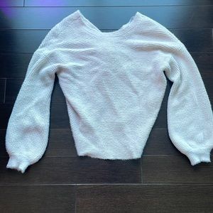 Cream tie-back sweater.